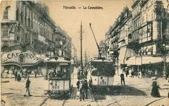 Old postcard of La Canebière street in Marseille with tram and pedestrians