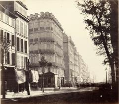 Historic view of La Canebière street in Marseille with vintage buildings and tram tracks