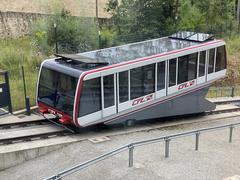 Pfaffenthal-Kirchberg Funicular railway car ascending between modern buildings in Luxembourg City