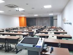 Typical classroom interior at University of Economics Ho Chi Minh City Campus B1 with desks and chairs
