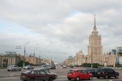 Kutuzovsky Avenue in Moscow on a sunny day with trees and cars