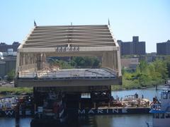 View looking northeast from west end of Harlem River Lift Bridge towards south end of new Willis Avenue Bridge on a sunny late morning