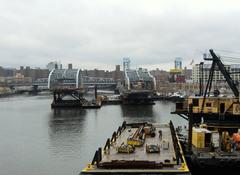 Looking upriver at the former Willis Avenue Bridge in two parts pending disposal