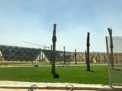 Grand Egyptian Museum exterior building in Giza with pyramids in the background
