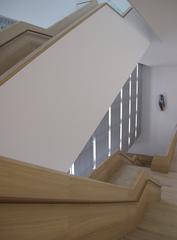 Stairway inside Museum Brandhorst in Munich, view looking down from the 1st floor to the main floor