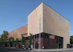 Main entrance of Museum Brandhorst in Munich, showcasing modern architectural design by Sauerbruch Hutton with colorful vertical panels