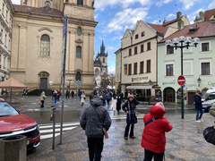 Street scene in Prague after shooting incident, life continues
