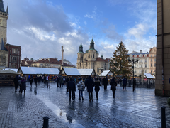 View of Prague cityscape with historical buildings at dusk after a shooting incident