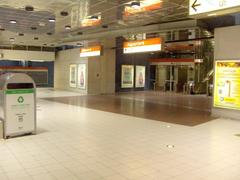 Kaisaniemi metro station platform with stairs and escalators in Helsinki