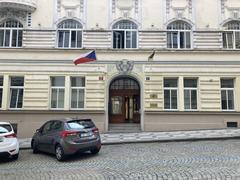 Street view of a tram track and surrounding buildings in Prague near Vltavská and Bio Oko cinema
