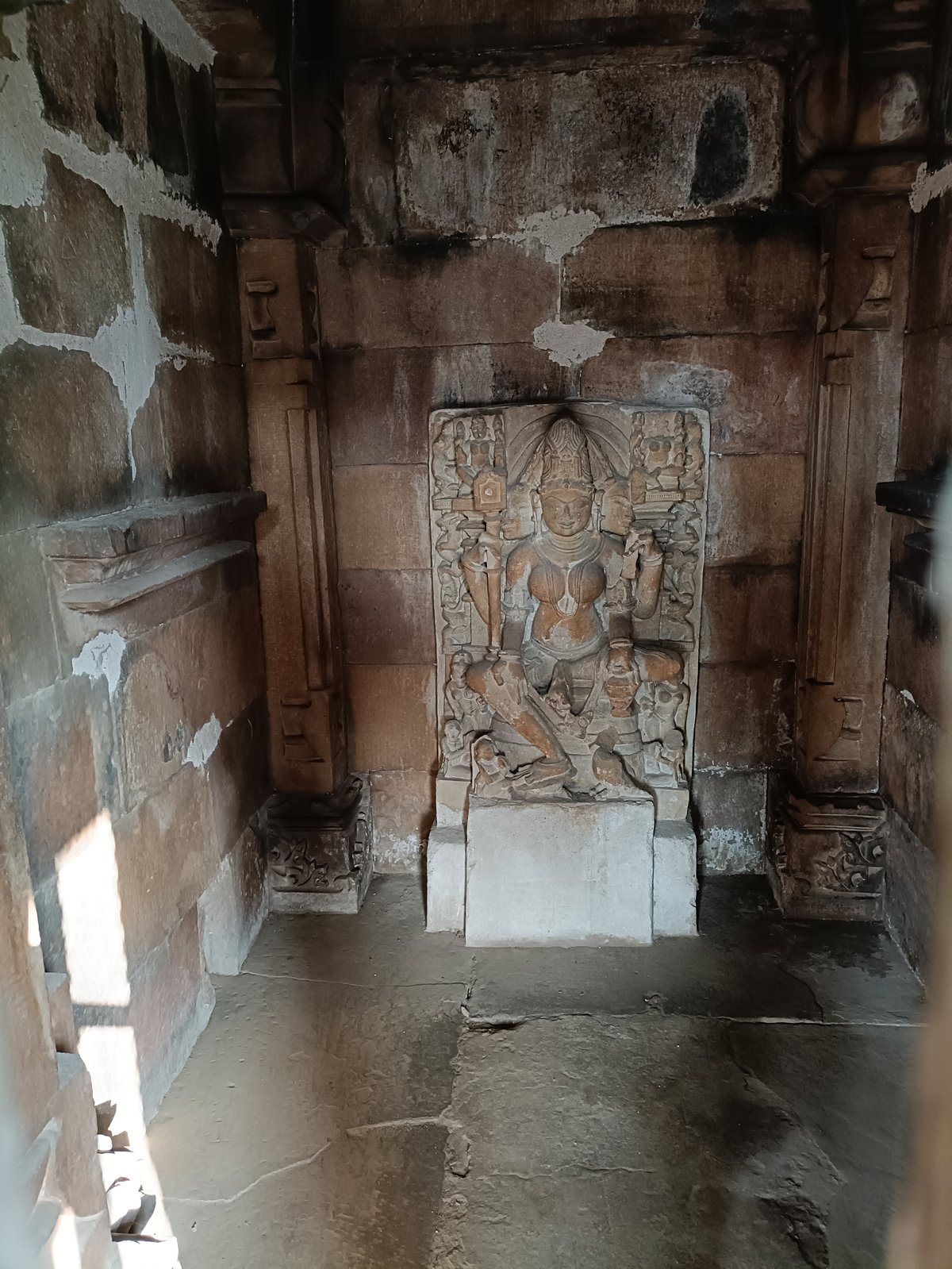 Ancient Khajuraho Mandir temple with intricate stone carvings and spires
