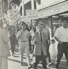 Students from University of San Diego College for Men demonstrating in Downtown San Diego during a United Nations Day anti-communism rally November 1960