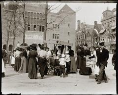 Crowd gathered at Beursplein square in Amsterdam during visit of Queen Wilhelmina in 1903 with Beurs van Berlage on left and Beursstraat buildings on right