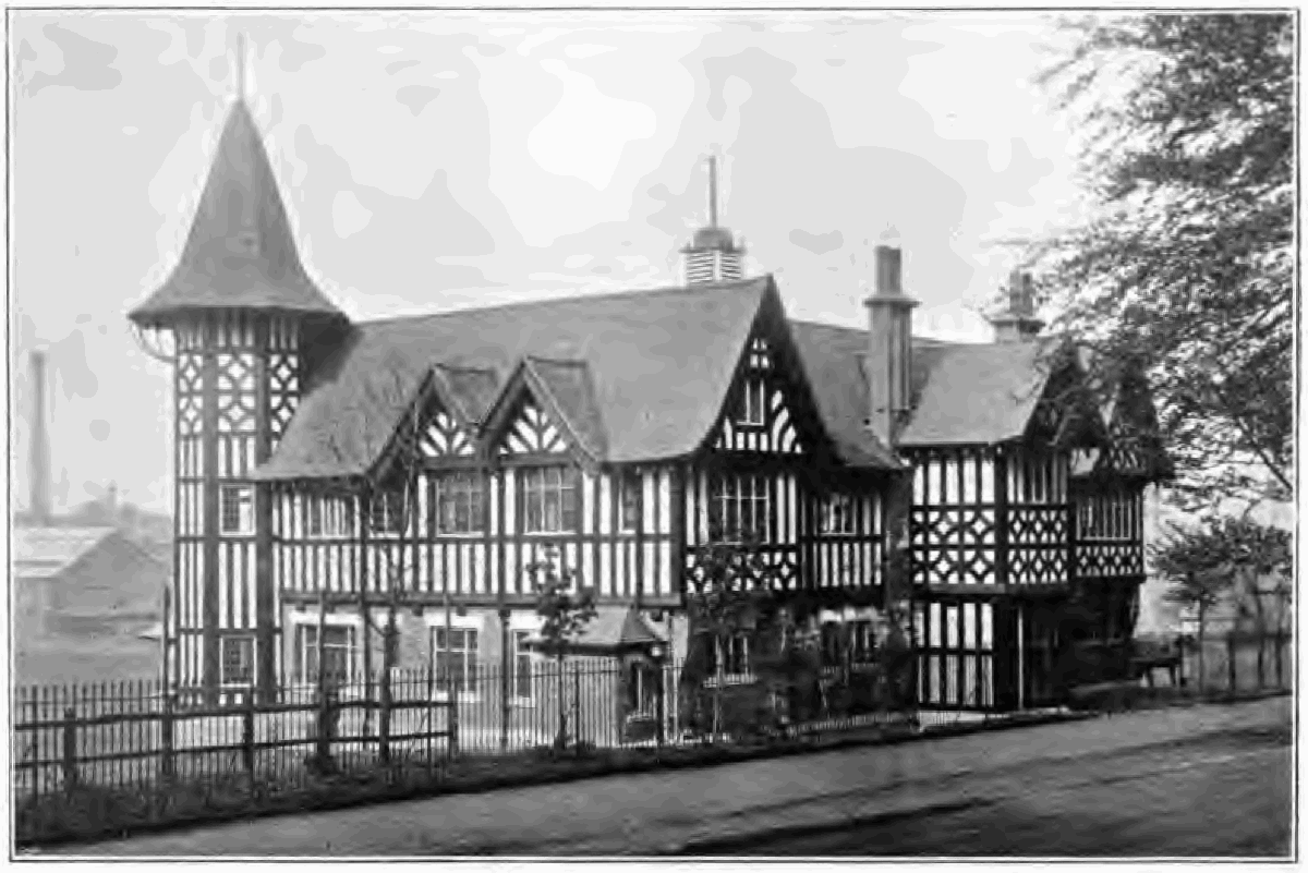Coronation cricket pavilion in Bournville surrounded by greenery
