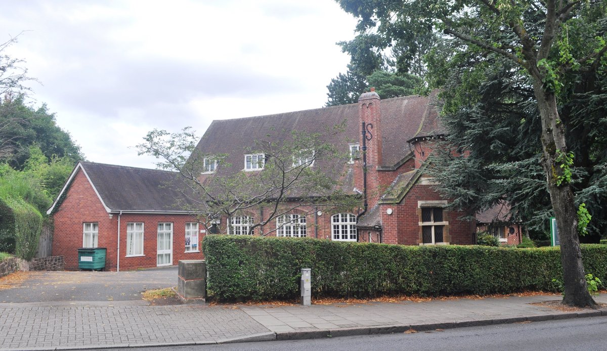 Friends Meeting House on Linden Road, Bournville, a Grade II listed building with historical brick architecture