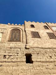 Luxor Temple with Abu Haggag Mosque in Luxor, Egypt under blue sky