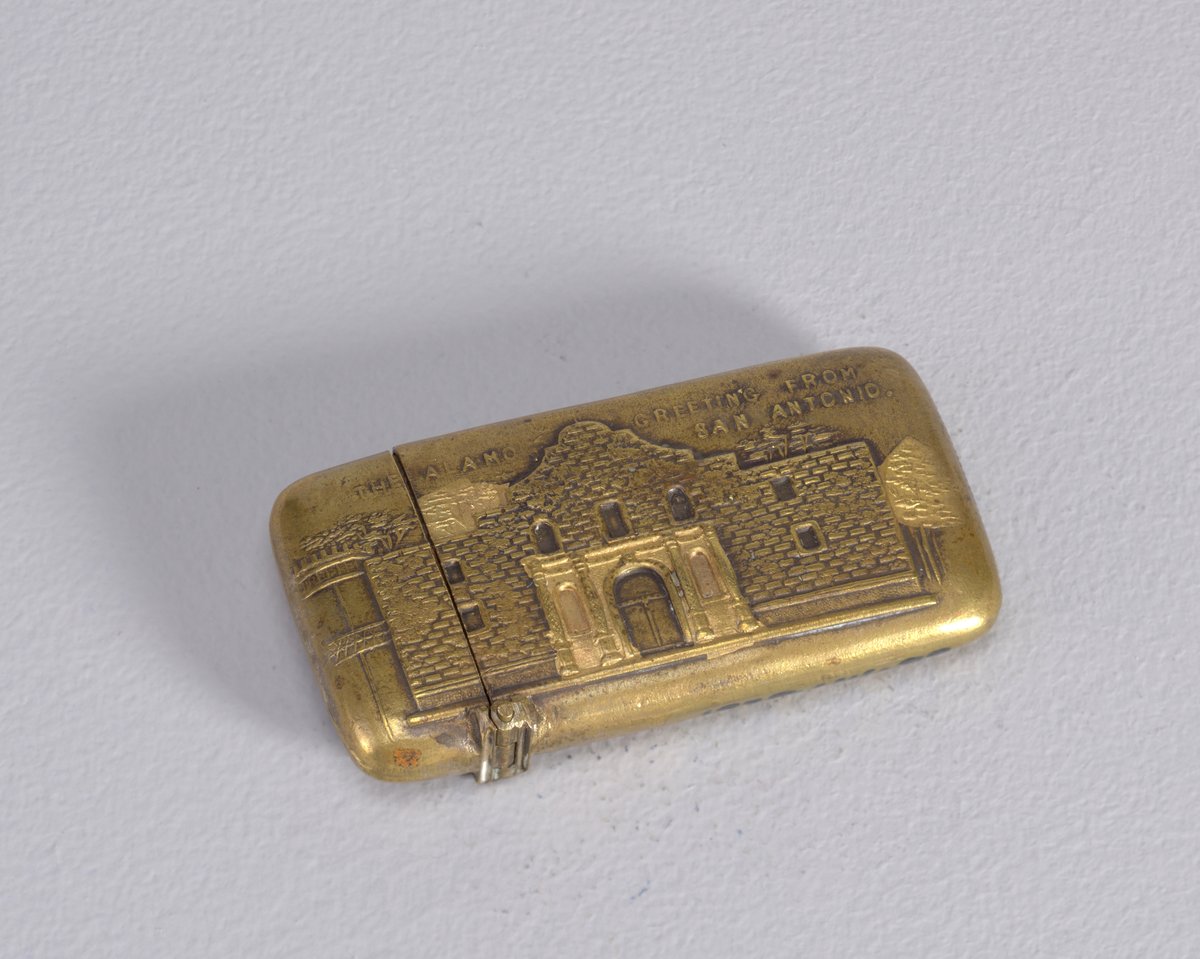 Vintage matchsafe with raised decoration of The Alamo facade and greeting from San Antonio
