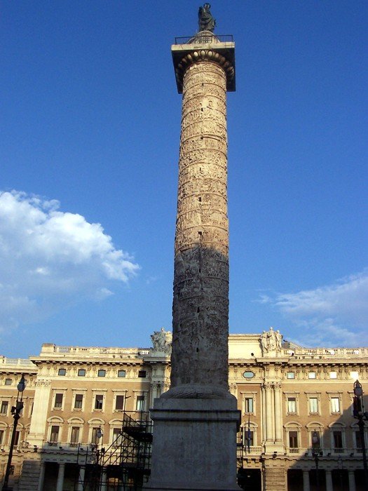Ancient Aurelian Column in Rome, Italy under a clear blue sky