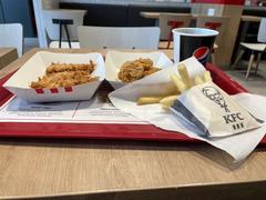 KFC hot wings, chicken strips, fries and drink meal at Itis mall Helsinki Finland