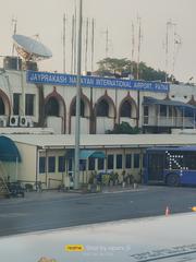 Patna Airport terminal building under blue sky