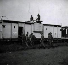 ARVN Security Guards boarding armored cars to protect a supply train passing from Saigon