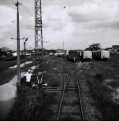 Engineer shuffling freight cars at Saigon railyard Vietnam National Railroad