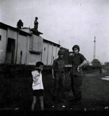 US Railroad Security Advisor conferring with ARVN security commander at Saigon railyard