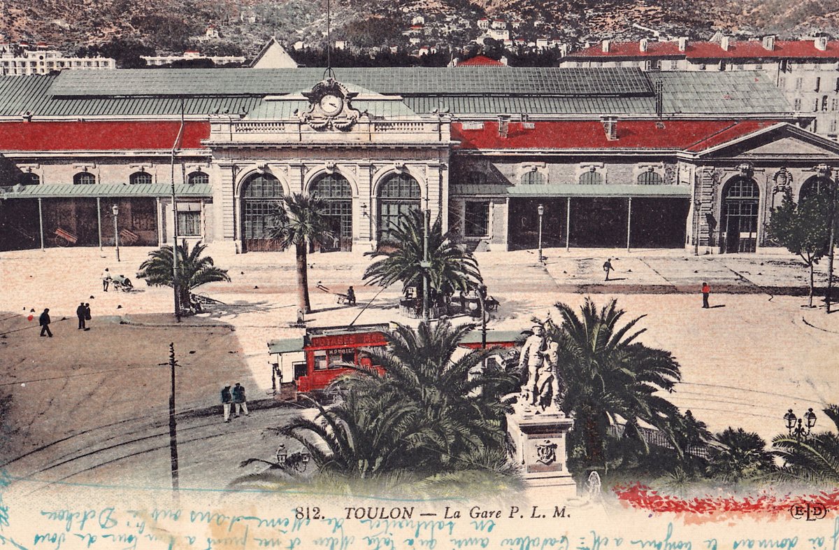 Vintage postcard showing Toulon train station with trains and passengers