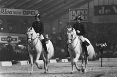 Two riders from the Spanish Riding School of Vienna performing at Jumping Amsterdam event in the RAI in 1970