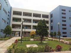Faculty of Education building with modern architecture and clear blue sky