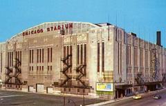 Chicago Stadium exterior with large red neon sign and round roof