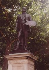 Statue of Sir John Millais in a park