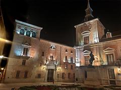 Plaza de la Villa in Madrid with historic medieval buildings including Casa y Torre de Lujanes under clear sky