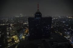Aerial view of Mexico City showcasing urban landscape and buildings