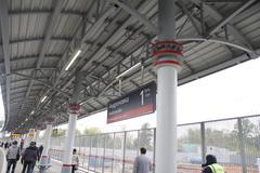 Andronovka MCC station platform with trains and passengers