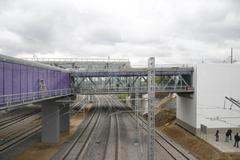Andronovka MCC station platform with passengers and trains