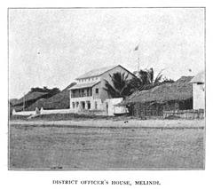 Black and white photograph of the House of Columns in Malindi viewed from a coastal steamer deck