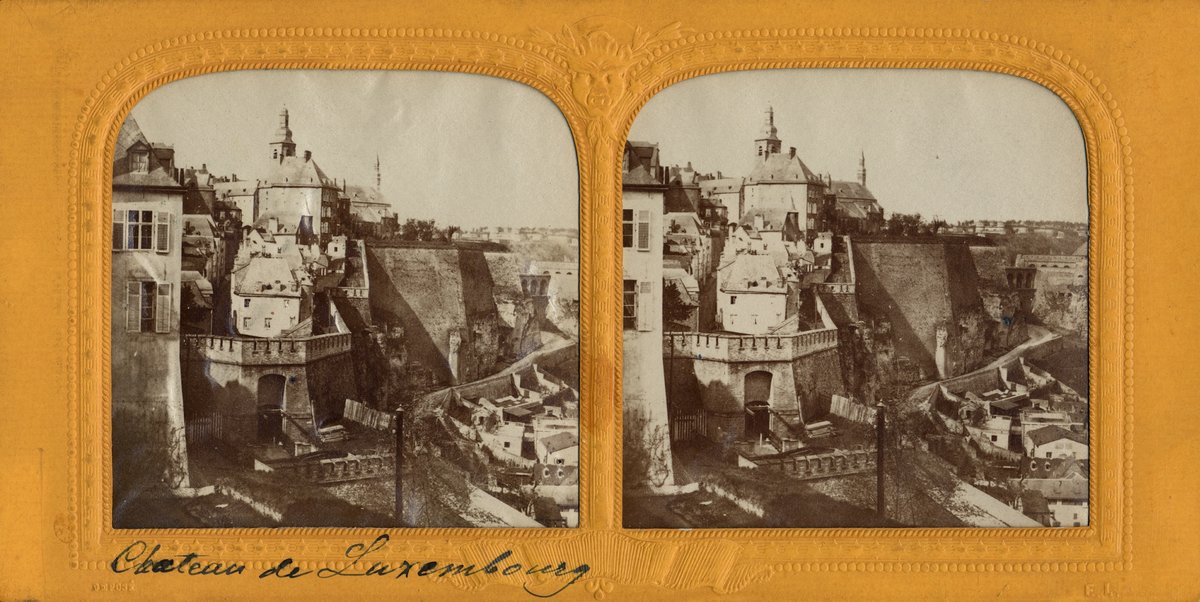 Chateau de Luxembourg gate with Michelskierch church and Schlassbréck bridge in Luxembourg city