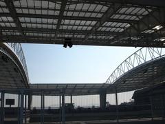 Roof structure of Dragão stadium in Porto, Portugal under clear blue sky