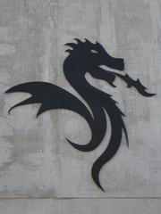 Dragão stadium symbol featuring a large dragon sculpture under blue sky