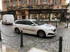 Photograph in Prague taken the day after a shooting, showing everyday life continuing
