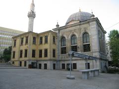Teşvikiye Mosque in Istanbul with surrounding greenery and blue sky