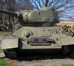 World War Two tank in a battlefield with soldiers