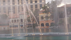Fountains of Bellagio water show at night with illuminated jets