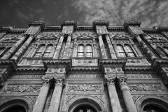 Dolmabahçe Palace in Istanbul with ornate architecture and bright blue sky