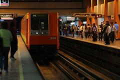 Interior view of a Metro train in Mexico City with passengers