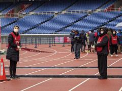 Rainy day at Waseda Ekiden relay race in Yokohama Nissan Stadium