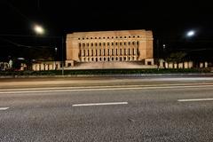 Eduskuntatalo parliament building illuminated at night in Helsinki