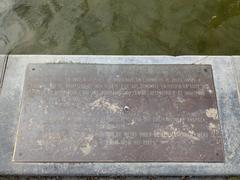 Descriptive plaque at Anspach Fountain on Quai au Bois à Brûler in Brussels