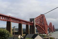 ScotRail 158738 train crossing the historic Forth Bridge in Scotland